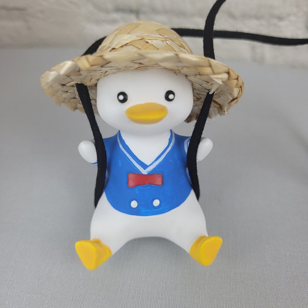 Car Mirror Duck Swing Accessory and Sunglasses Visor Clip